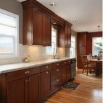 cherry kitchen cabinets with granite countertops cherry cabinets and white subway PQNLZWT