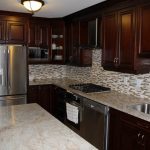 cherry kitchen cabinets with granite countertops dark cherry coloured custom kitchen cabinets with granite countertop kitchen QDLZVXE
