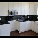 white kitchen cabinets with black countertops backsplash ideas for black granite countertops and white cabinets JAIZEWJ