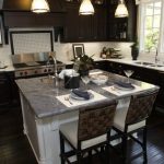 white kitchen cabinets with dark wood floors this kitchen features an almost black wooden flooring and cabinets. CAMRHIU