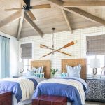 Seagrass Twin Headboards Under Decorative Wall Oars - Cottage