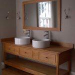Double Vessel Sinks Open Style Bathroom Vanity with three drawers .