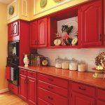 Rich red hues on cabinets and reddish brown countertops give your .