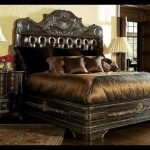 1 High end master bedroom set carvings and tufted leather .