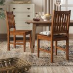 Loon Peak® Fort Kent Slat Back Side Dining Chair in Medium Oak .