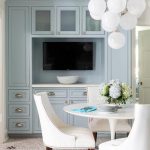 White Fabric Nailhead Dining Chairs at Saarinen Table .