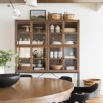 Round Brown Wooden Dining Table with Black Chairs - Cottage .