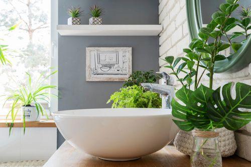 Add greenery with plants for freshness in modern bathroom designs