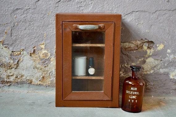 Vintage glass jars serve ‍as charming storage solutions in your boho ​bathroom