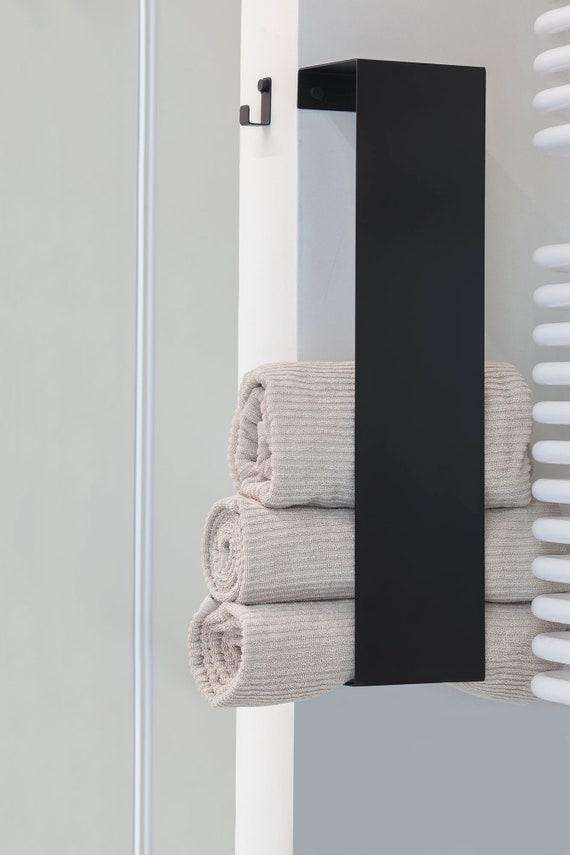 Add whimsical touches like a ladder for hanging towels in your eclectic bathroom