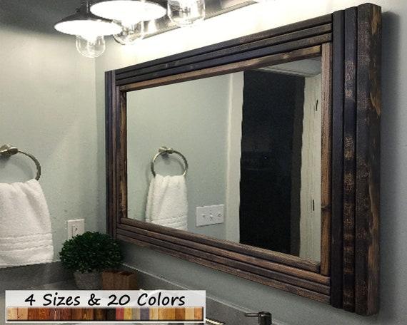 Add stylish wooden mirrors to ​elevate your⁤ wooden bathroom decor