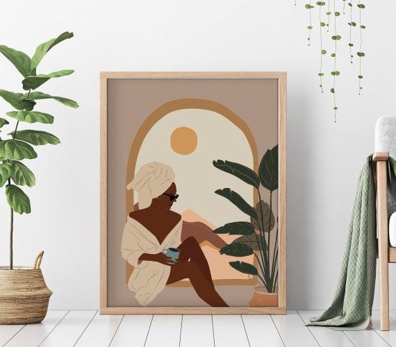 Earthy-toned wall art brightens your boho bathroom without overwhelming the space