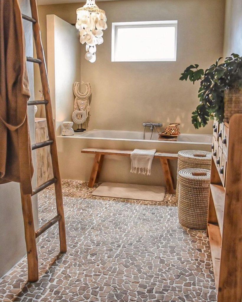 Use natural wood shelves to enhance your boho bathroom aesthetic