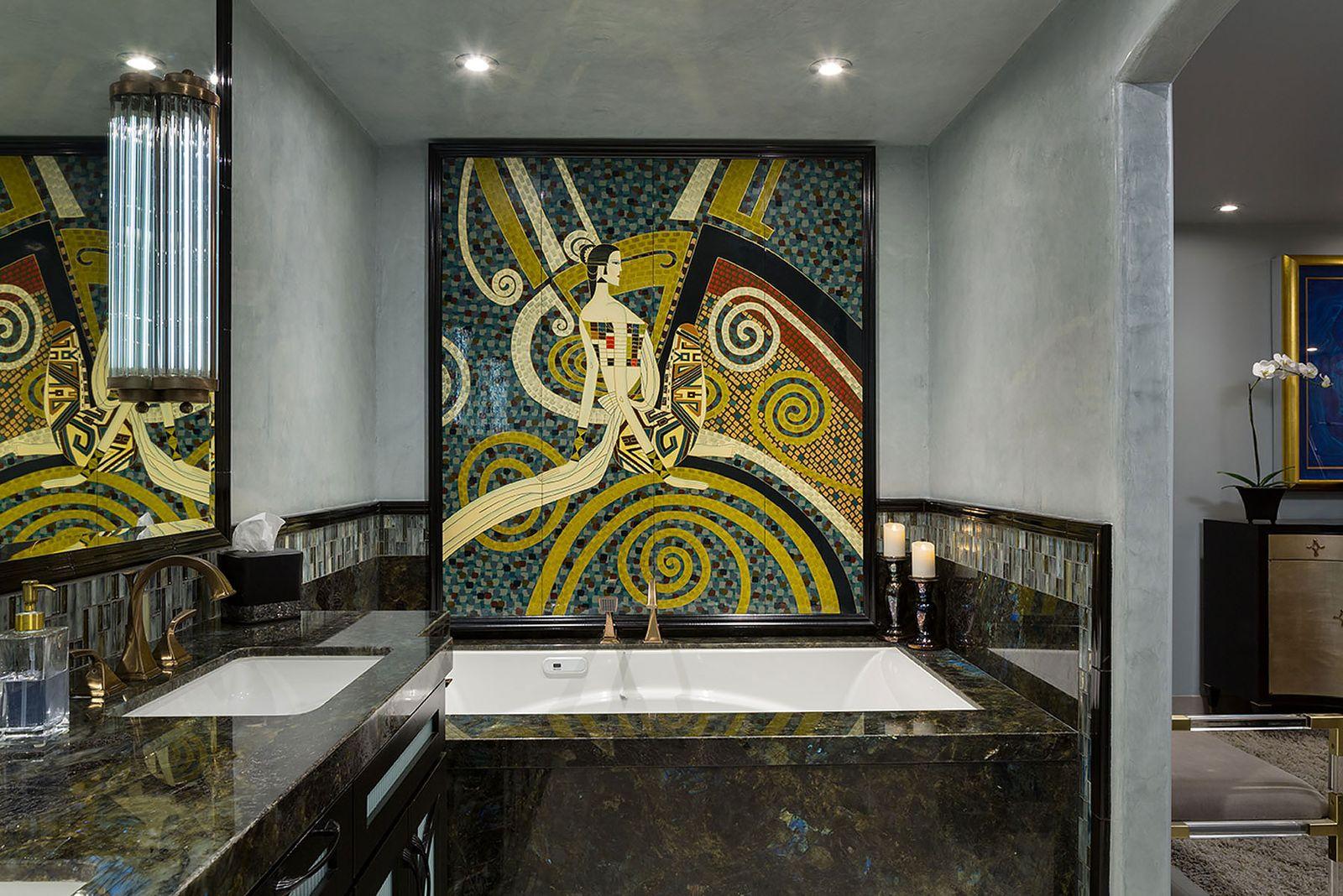 Art deco bathroom boasting bold patterns and luxurious details