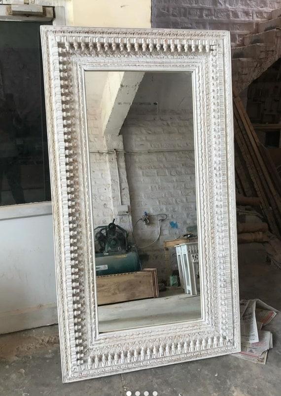 Incorporate a statement mirror to reflect light ‌and style⁤ in your boho⁣ bathroom