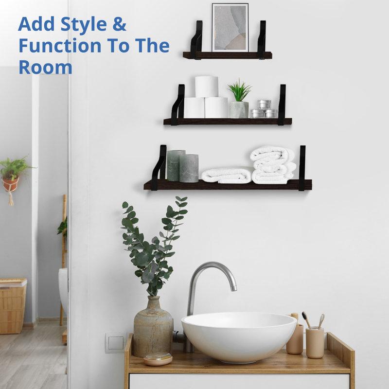 Floating wooden bathroom shelves create a spacious feel