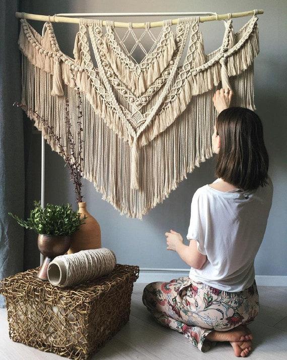 Add macramé wall hangings to infuse texture into your boho bathroom design