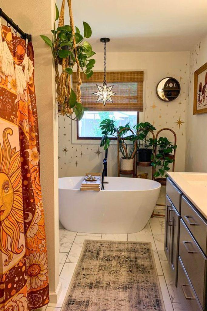 Potted plants bring life and​ color to your boho bathroom oasis