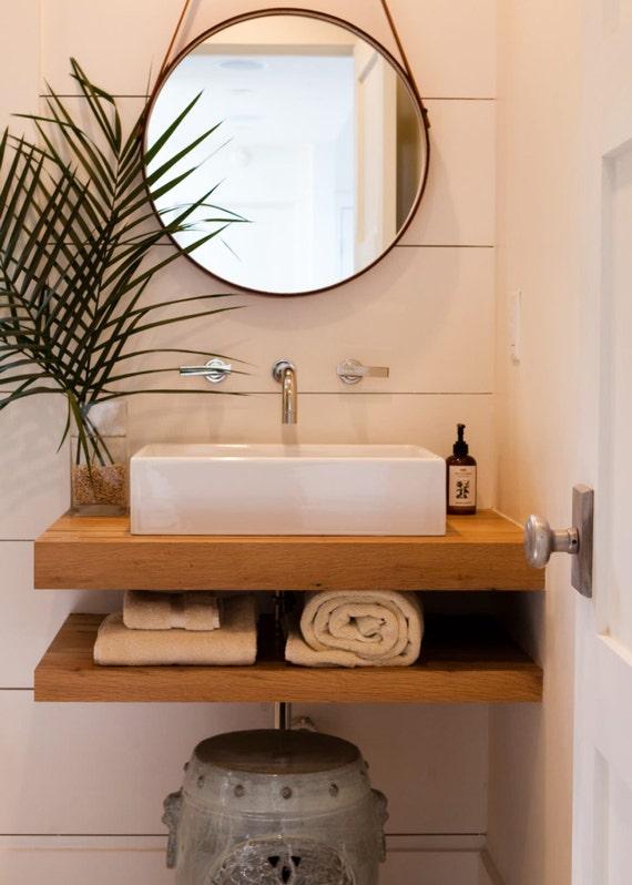 Incorporate floating vanities to create an⁤ open, airy modern bathroom