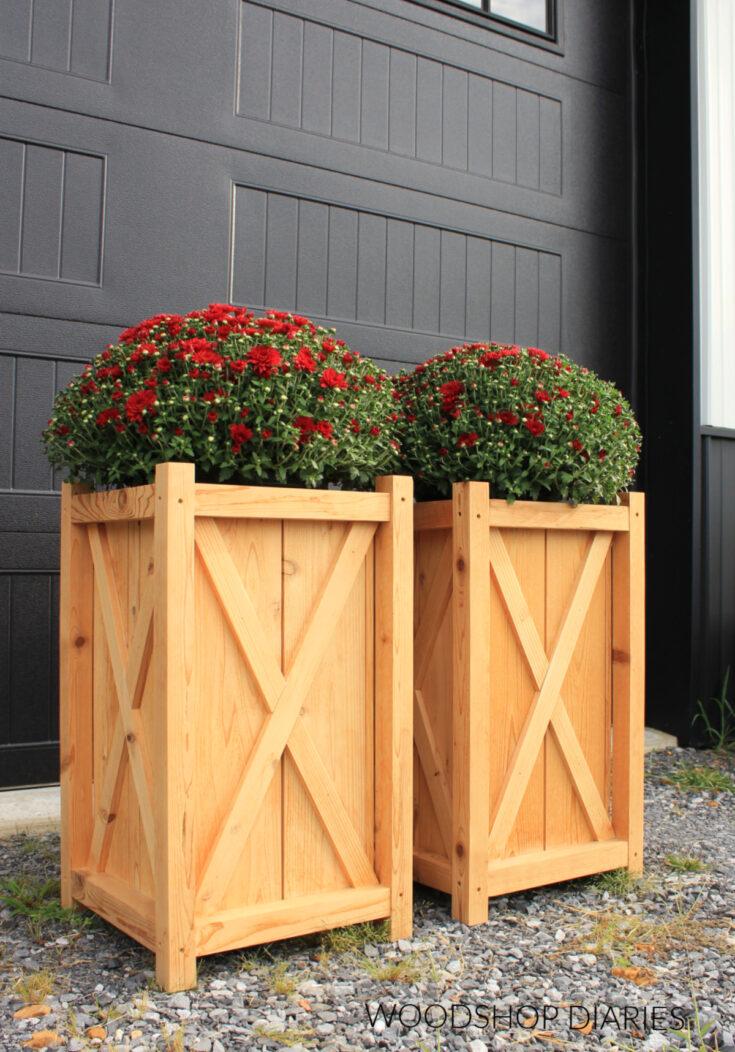 Pair potted plants with your modern wooden⁣ bathroom design