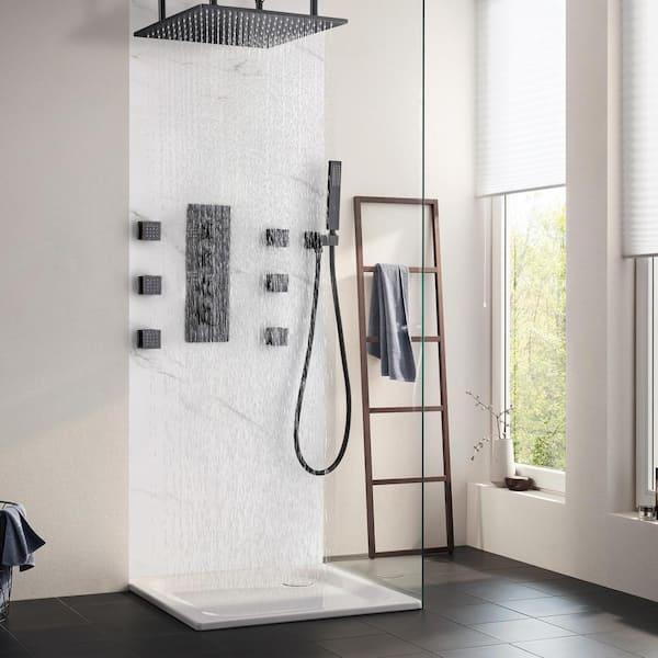 A ⁤rain showerhead ⁤creates a spa-like experience⁣ in ‍your ⁣boho bathroom