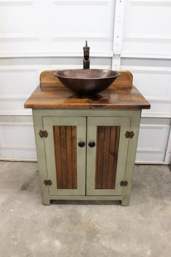 Consider a ⁢wooden bathroom vanity with‍ unique grain patterns