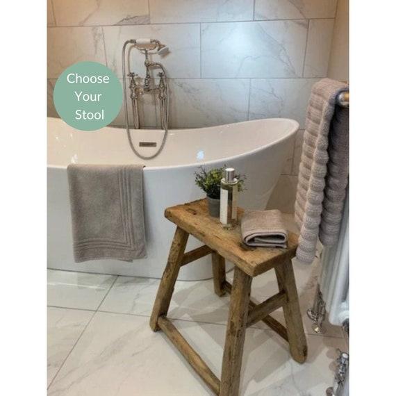 Vintage wooden⁤ stools add functionality and style to your wooden bathroom