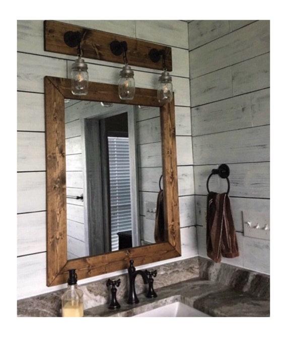 Rustic‌ wooden‌ mirrors amplify charm ⁢and depth in your wooden bathroom