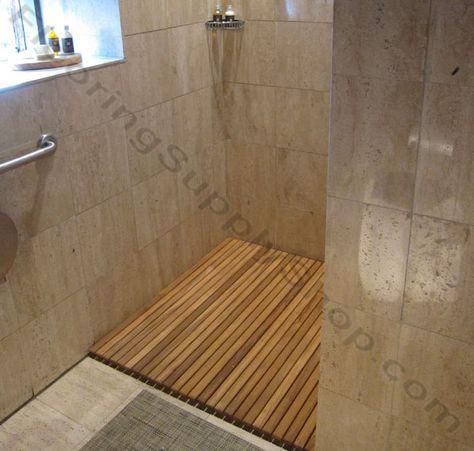 Install teak wood flooring for durability in your wooden bathroom