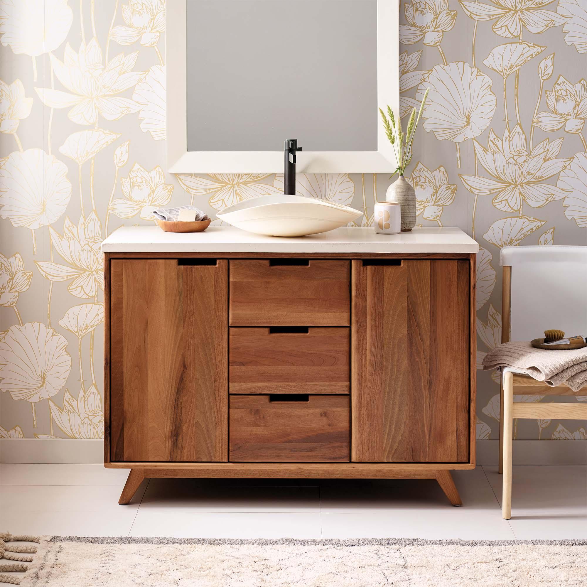 A wooden bathroom counter adds unique texture and style