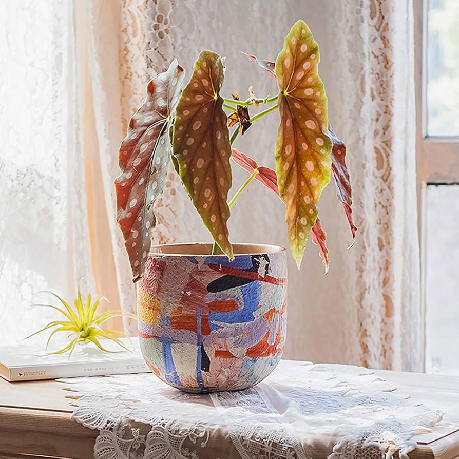 Choose vintage ceramic planters to‍ accessorize your boho bathroom spaces