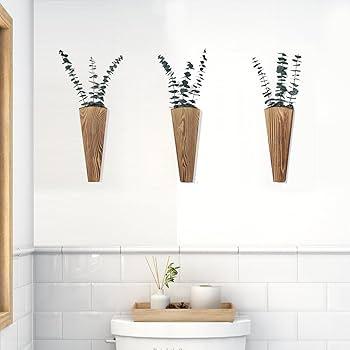 Add potted ‌plants for​ life in your wooden bathroom