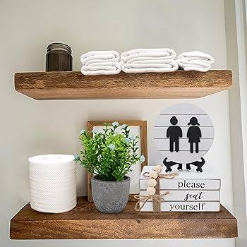 Use unique shelving solutions to display quirky decor⁤ in⁢ your eclectic bathroom