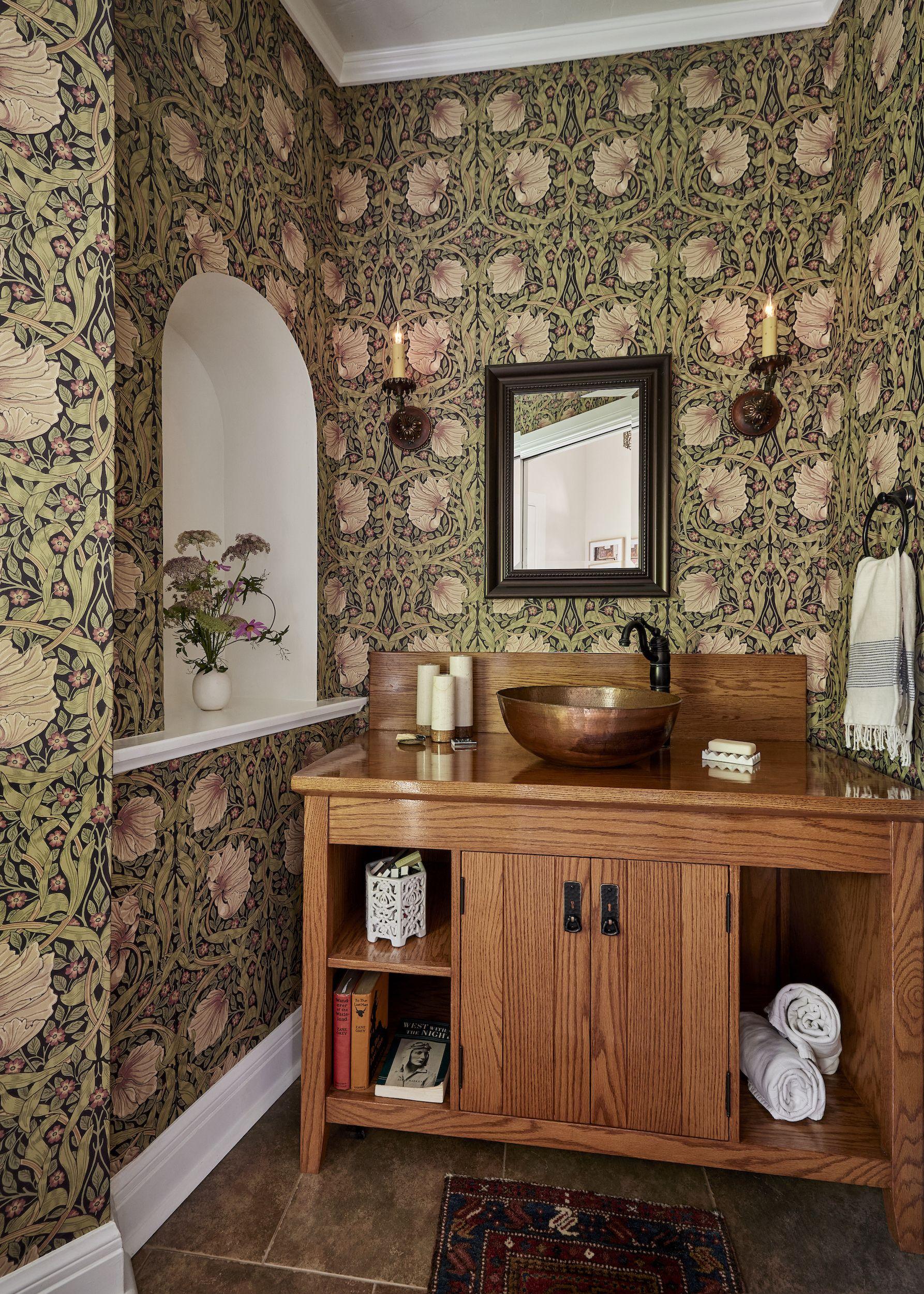 Collectible items​ displayed create a curated look in your eclectic ​bathroom