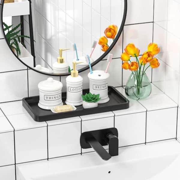 Use decorative trays to organize products and keep your eclectic ‍bathroom tidy