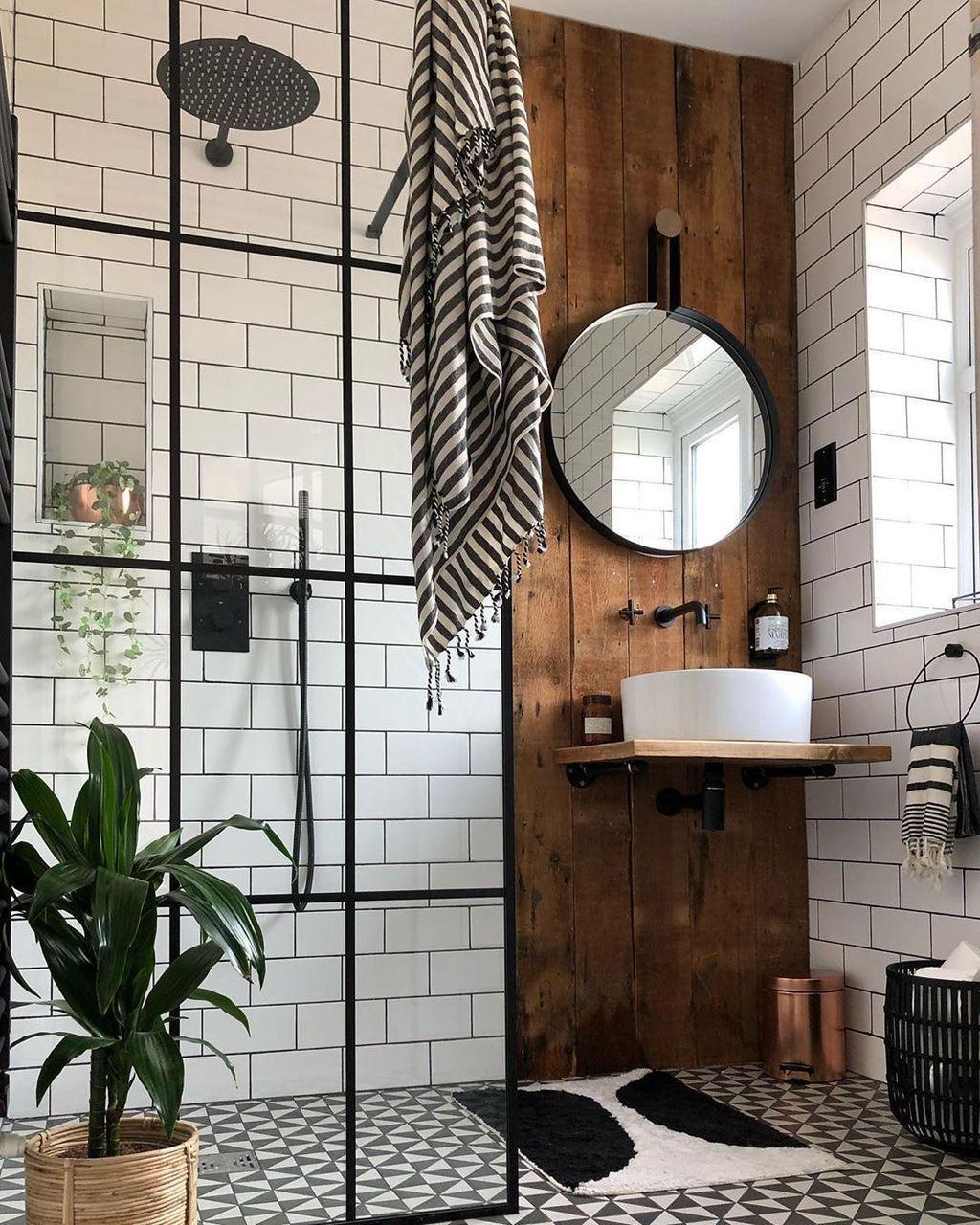 Industrial Edge: ⁣Expose pipes and use metallic accents in your bathroom