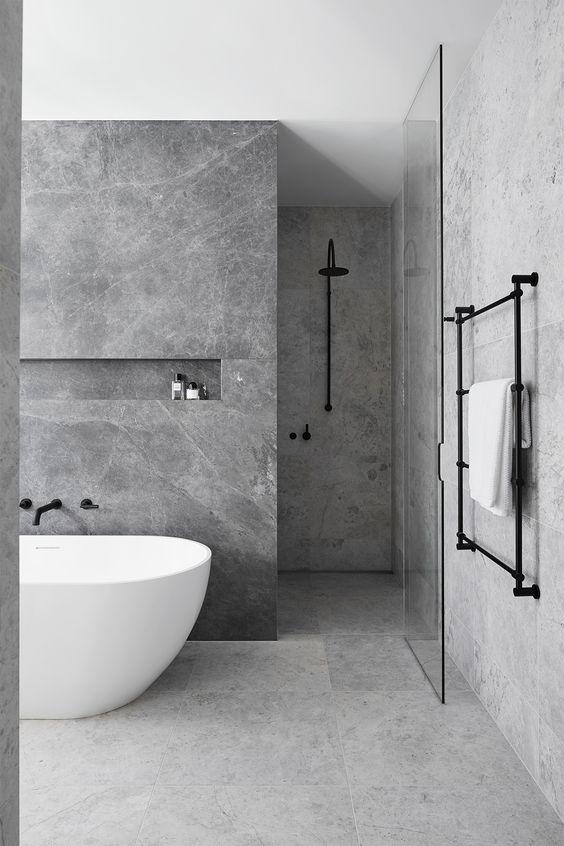 Minimalist design principles offer tranquility in a modern bathroom space