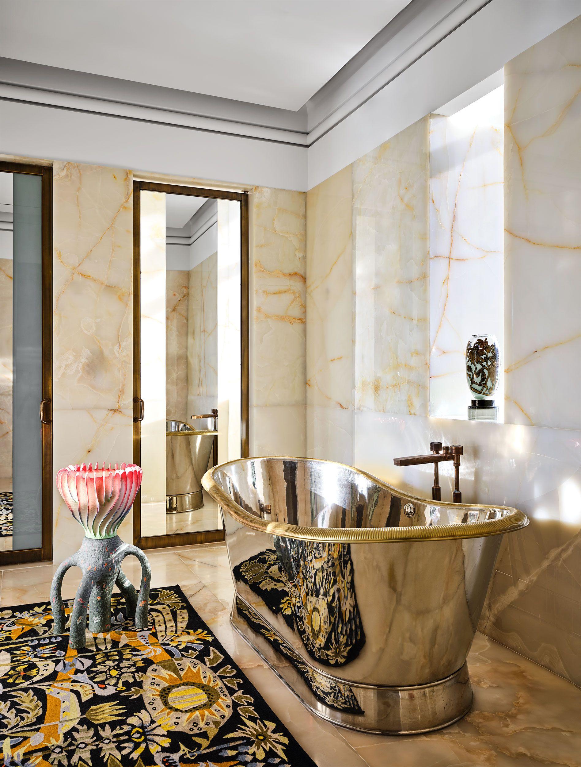 Luxurious⁤ Retreat: Add plush textiles and gold accents‍ to your bathroom