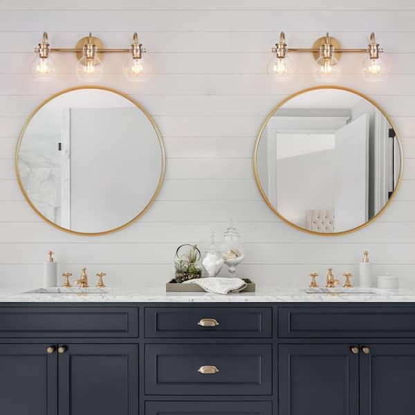 Glamorous Hollywood bathroom adorned with‍ gold fixtures ⁤and dramatic lighting