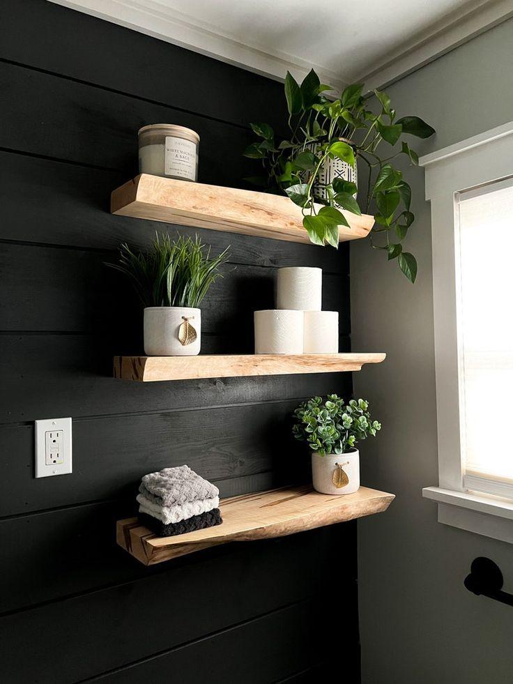 Add live plants for a fresh vibe in ​your wooden bathroom