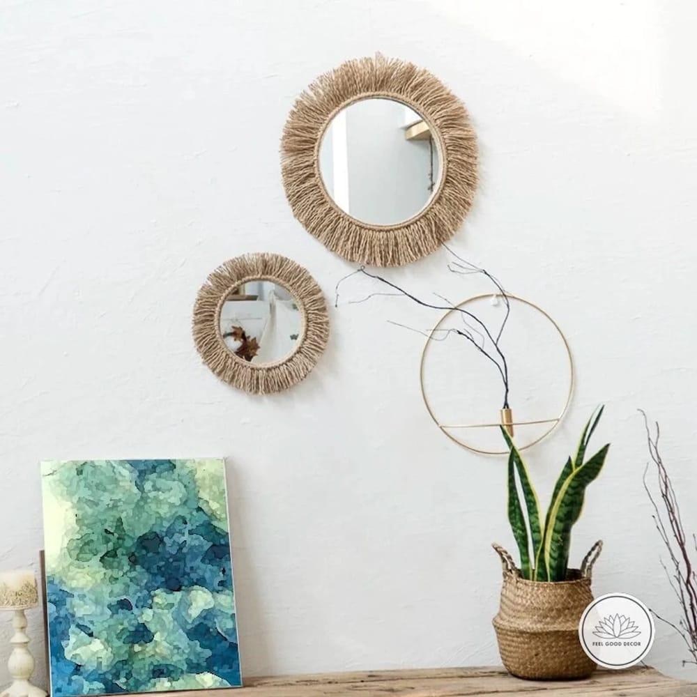 A bohemian-style mirror adds character​ and charm to your boho bathroom