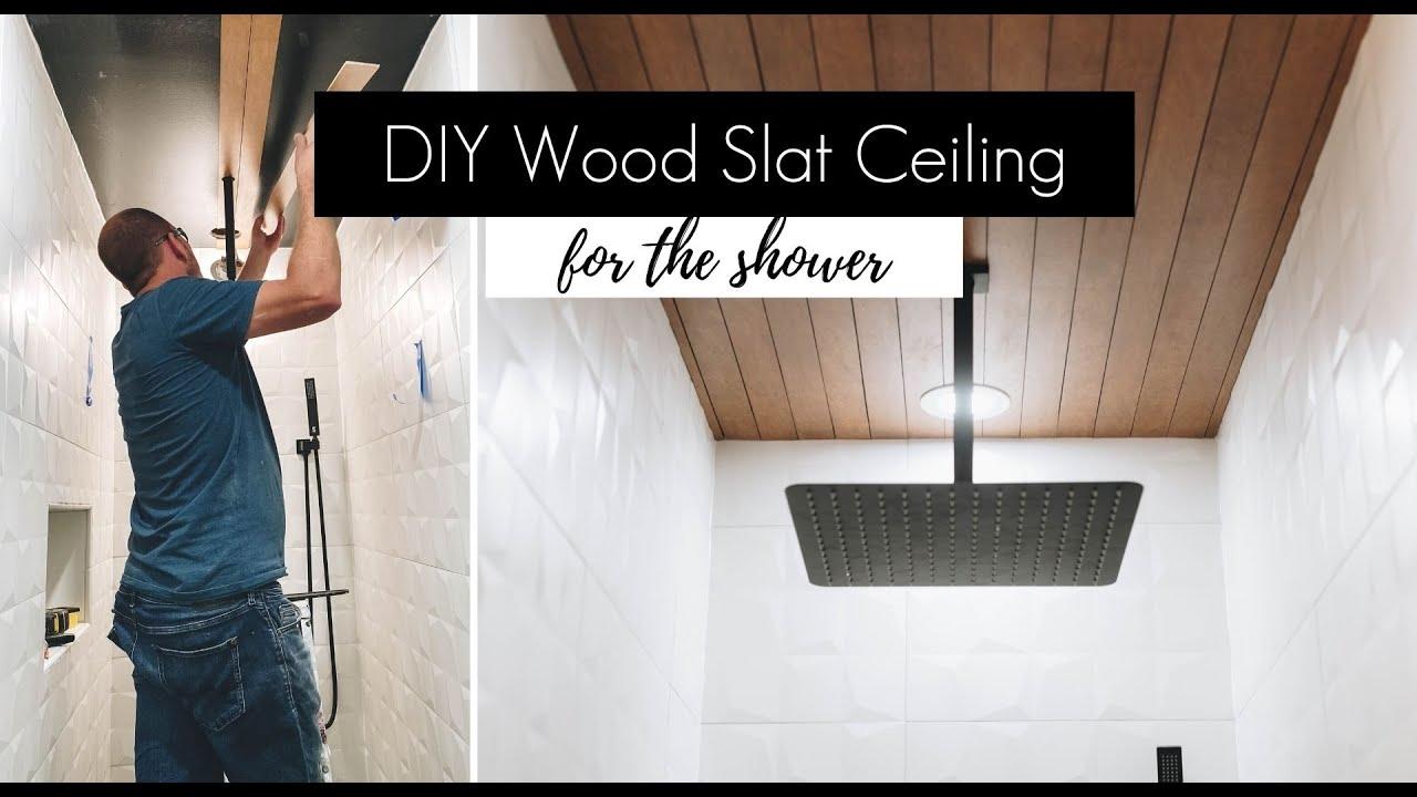 Install a wooden ceiling for added coziness ‍in the‌ wooden bathroom