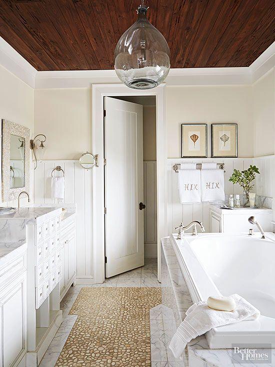 Crafted wooden beams enhance the boho bathroom’s architectural ​appeal