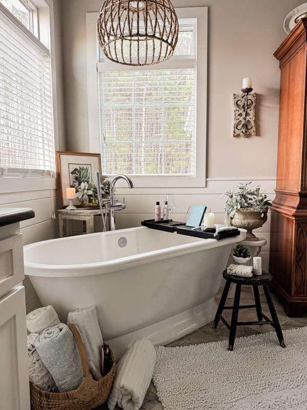 Showcase antique furniture pieces as storage solutions in your eclectic bathroom