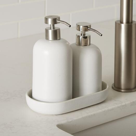 Incorporate sculptural elements, like a unique soap dispenser, to spark interest in ‌your eclectic bathroom