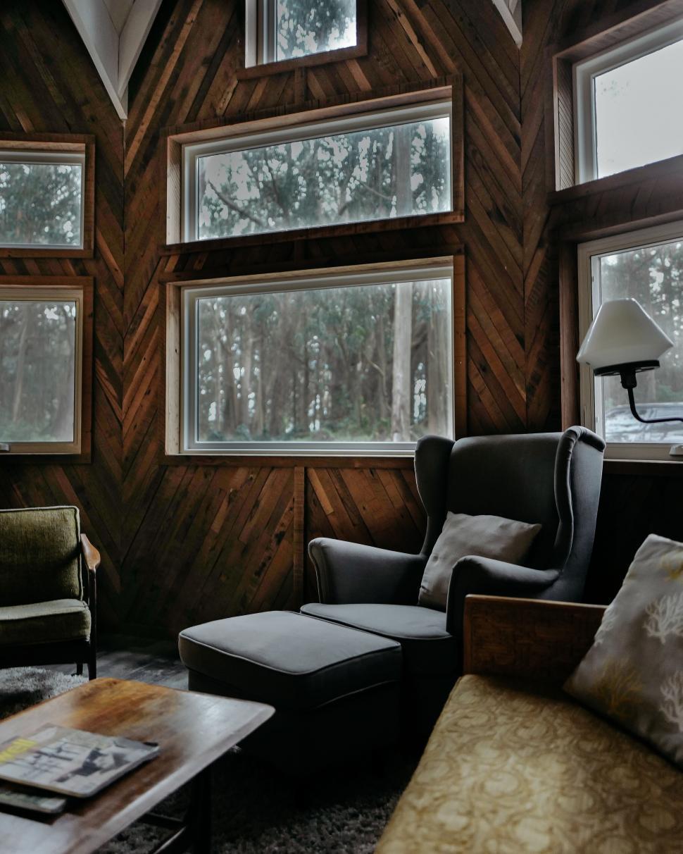 Opt for wooden paneling to create warm, ​inviting walls