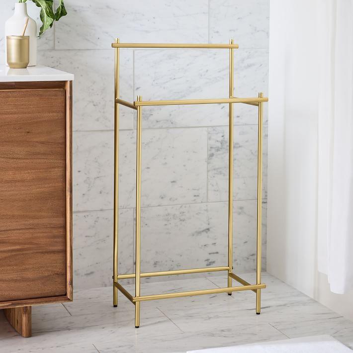 Use an antique ladder as a towel rack in your eclectic bathroom design