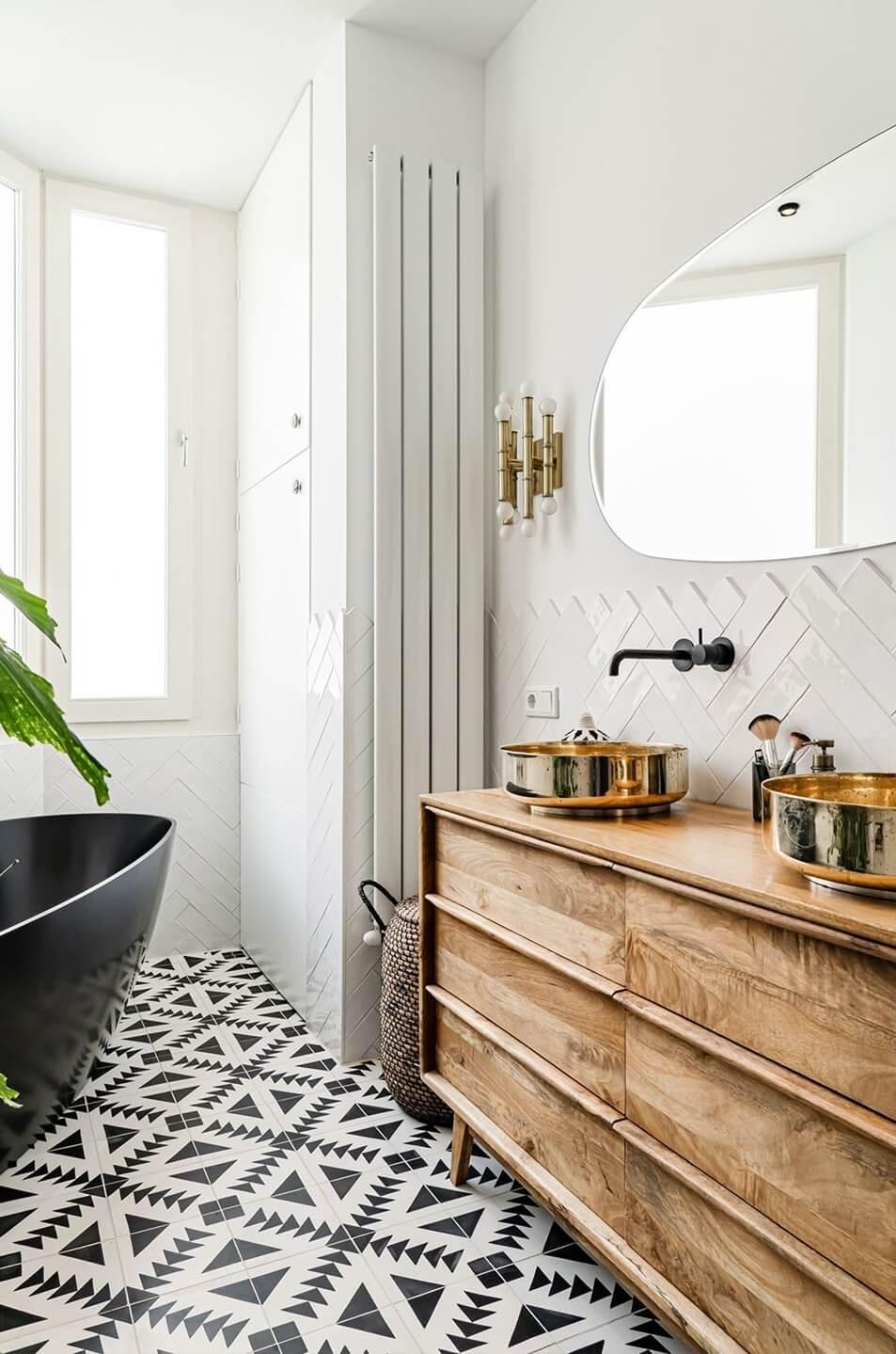 Introduce geometric patterns‌ to elevate a stylish modern bathroom