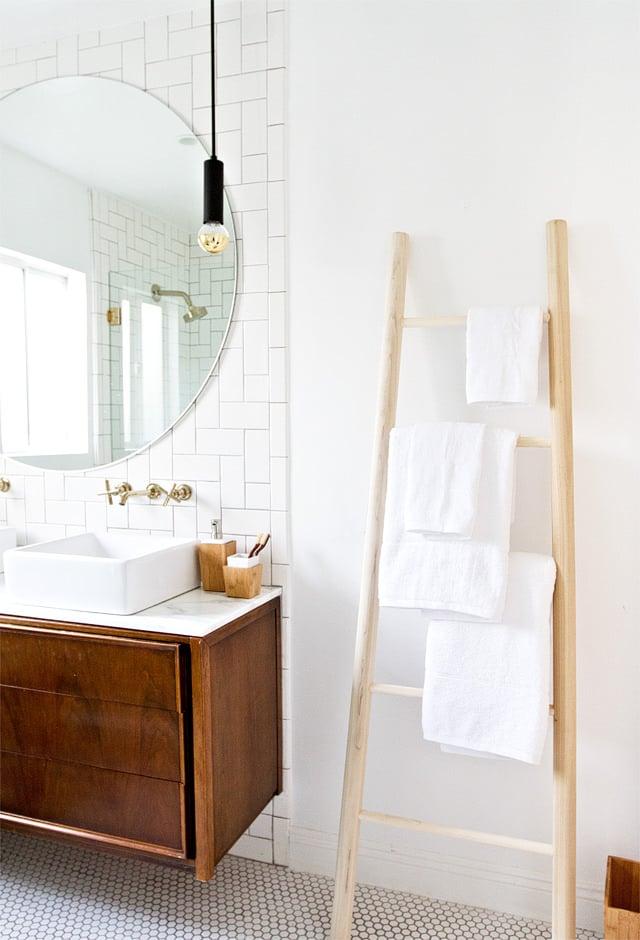 Incorporate a ⁣wooden ladder ​for ‍towel storage in your chic boho bathroom