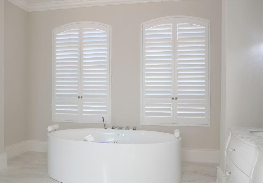 Wooden bathroom blinds enhance privacy with style